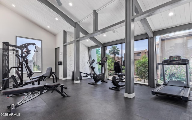 gym with recessed lighting, high vaulted ceiling, and baseboards