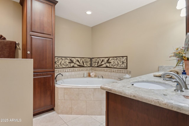 full bathroom featuring tile patterned flooring, a sink, and a bath