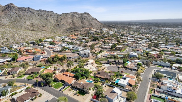 aerial view with a residential view and a mountain view