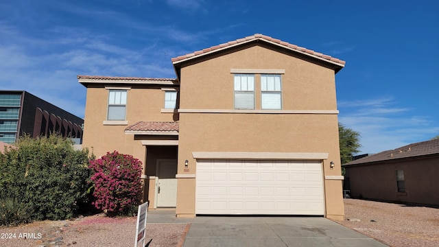 view of front of home with a garage