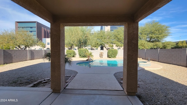 view of pool featuring a patio area