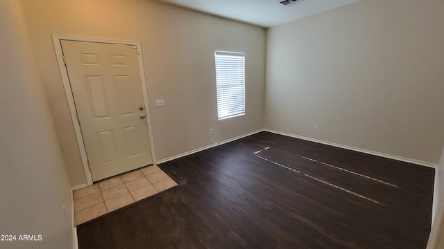 foyer entrance with hardwood / wood-style floors