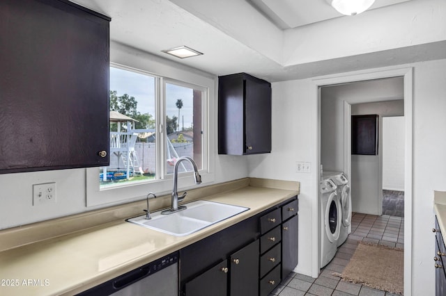 3222 W Hearn Rd, Phoenix, AZ 85053 - kitchen with a sink, stainless steel dishwasher, independent washer and dryer, and light countertops