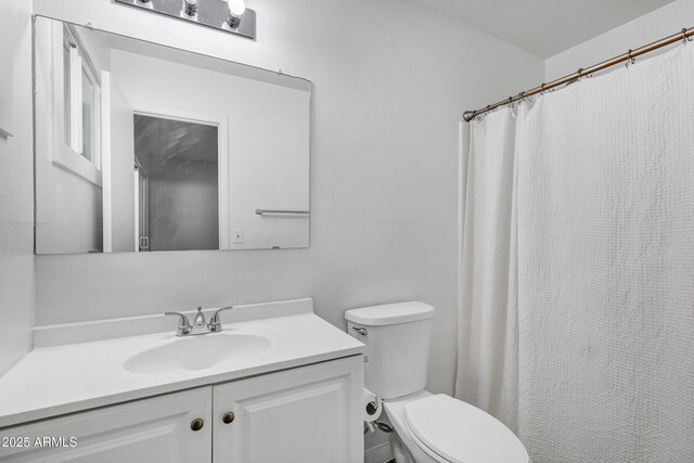 3222 W Hearn Rd, Phoenix, AZ 85053 - bathroom with toilet, vanity, and a shower with shower curtain