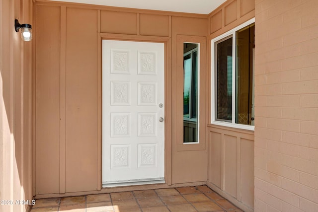 3222 W Hearn Rd, Phoenix, AZ 85053 - doorway to property featuring board and batten siding