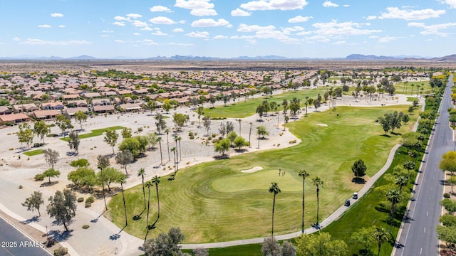 bird's eye view with view of golf course, a residential view, and a mountain view