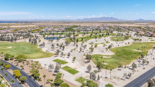 birds eye view of property with a residential view, a water and mountain view, and golf course view