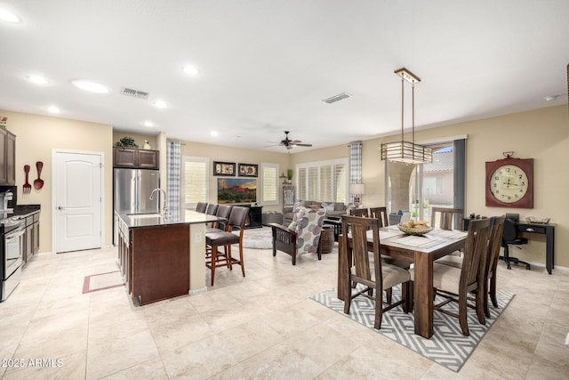 dining area with ceiling fan, recessed lighting, and visible vents
