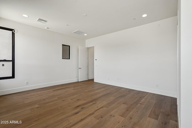 13278 E Buckskin Trl, Scottsdale, AZ 85255 - spare room featuring hardwood / wood-style flooring, baseboards, and recessed lighting