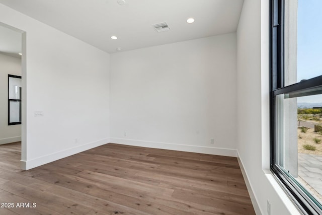 13278 E Buckskin Trl, Scottsdale, AZ 85255 - empty room featuring wood finished floors, recessed lighting, and baseboards