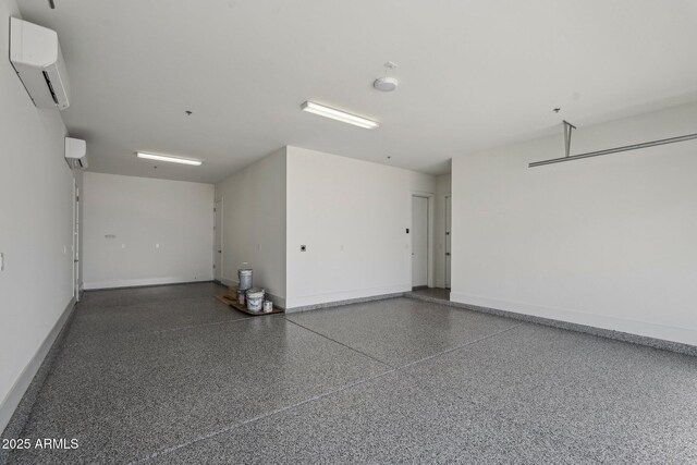 13278 E Buckskin Trl, Scottsdale, AZ 85255 - garage with a wall mounted AC and baseboards
