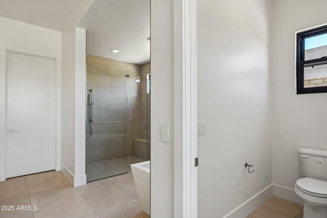13278 E Buckskin Trl, Scottsdale, AZ 85255 - bathroom with toilet, a shower stall, baseboards, and tile patterned floors