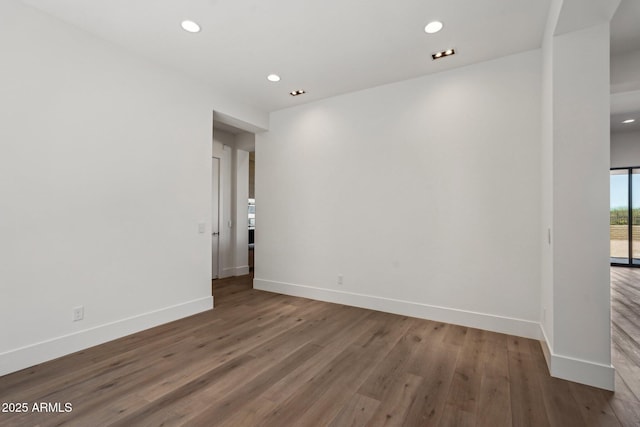 13278 E Buckskin Trl, Scottsdale, AZ 85255 - spare room featuring baseboards, wood finished floors, and recessed lighting