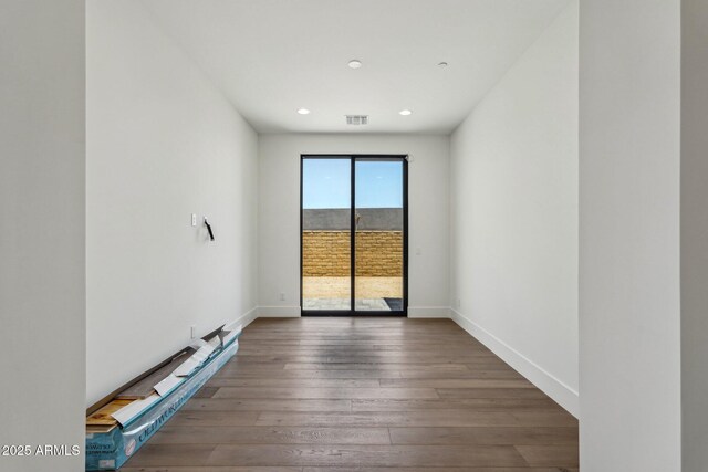 13278 E Buckskin Trl, Scottsdale, AZ 85255 - spare room featuring wood-type flooring, recessed lighting, and baseboards