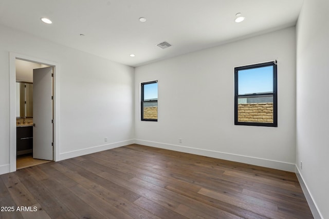 13278 E Buckskin Trl, Scottsdale, AZ 85255 - unfurnished room featuring dark wood-style floors, baseboards, and recessed lighting