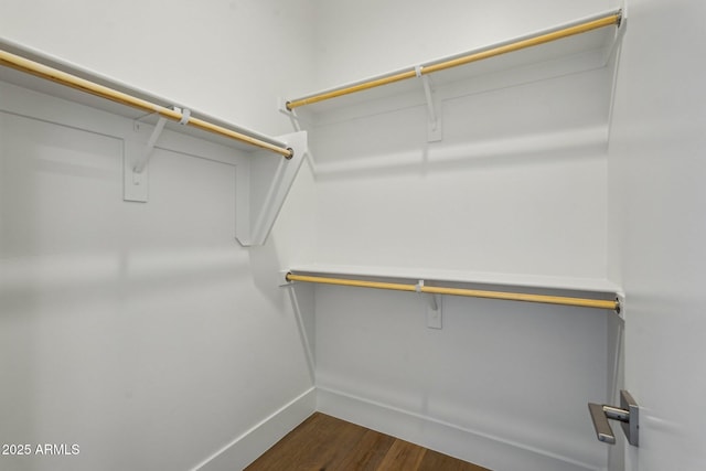 13278 E Buckskin Trl, Scottsdale, AZ 85255 - walk in closet featuring dark wood-type flooring