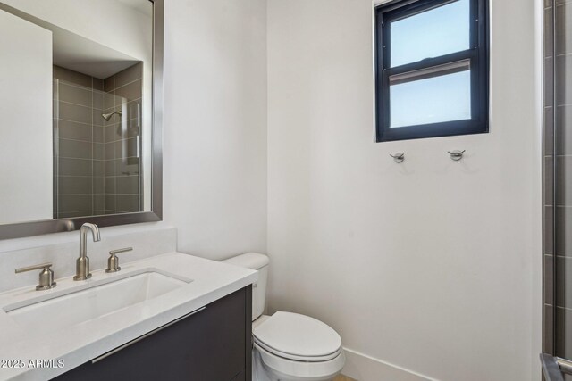 13278 E Buckskin Trl, Scottsdale, AZ 85255 - bathroom featuring toilet, tiled shower, and vanity