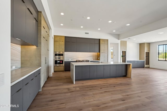 13278 E Buckskin Trl, Scottsdale, AZ 85255 - kitchen featuring modern cabinets, gray cabinets, a sink, recessed lighting, and open floor plan