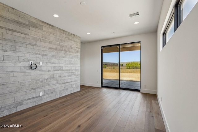 13278 E Buckskin Trl, Scottsdale, AZ 85255 - empty room with baseboards, wood finished floors, and recessed lighting