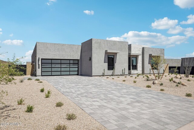 13278 E Buckskin Trl, Scottsdale, AZ 85255 - modern home with a garage, decorative driveway, and stucco siding