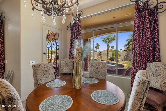18036 W San Miguel Ave, Litchfield Park, AZ 85340 - dining room with a chandelier