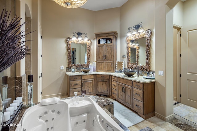 18036 W San Miguel Ave, Litchfield Park, AZ 85340 - full bath featuring vanity and a whirlpool tub