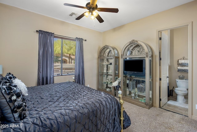 18036 W San Miguel Ave, Litchfield Park, AZ 85340 - bedroom with carpet floors, connected bathroom, and ceiling fan