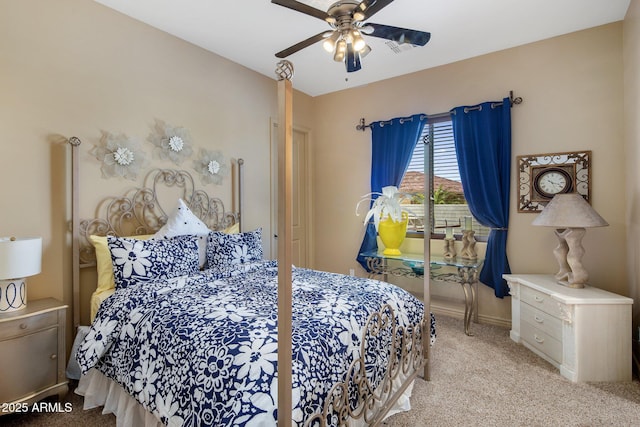 18036 W San Miguel Ave, Litchfield Park, AZ 85340 - bedroom with carpet floors, baseboards, and a ceiling fan