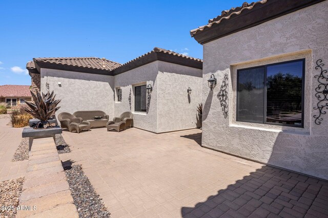 18036 W San Miguel Ave, Litchfield Park, AZ 85340 - view of patio featuring outdoor lounge area