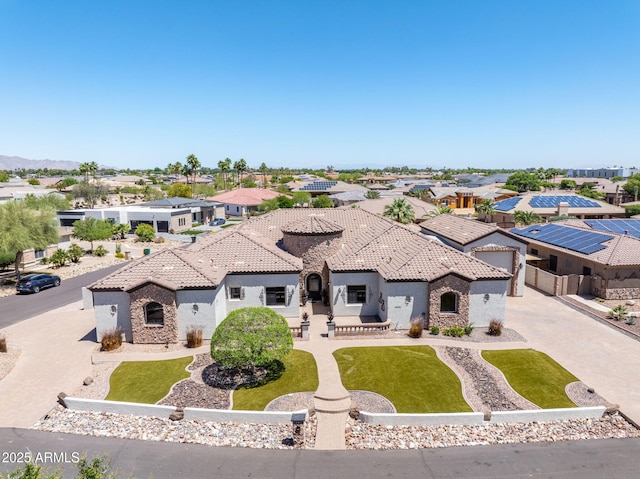 18036 W San Miguel Ave, Litchfield Park, AZ 85340 - view of front of home featuring stone siding, stucco siding, and a tile roof