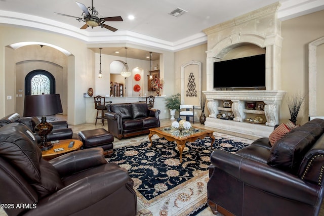 18036 W San Miguel Ave, Litchfield Park, AZ 85340 - living area with ceiling fan, arched walkways, and recessed lighting