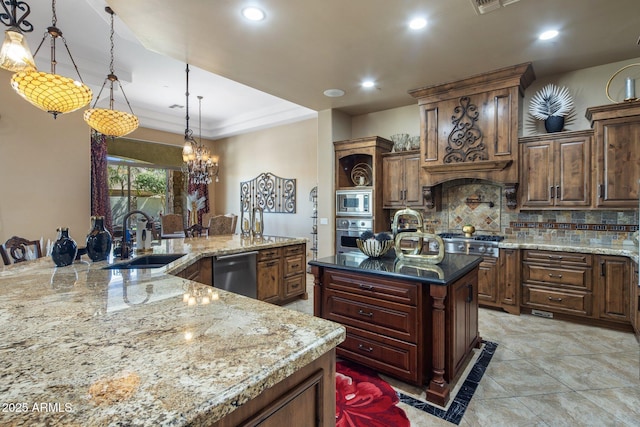 18036 W San Miguel Ave, Litchfield Park, AZ 85340 - kitchen with a sink, a spacious island, tasteful backsplash, appliances with stainless steel finishes, and recessed lighting