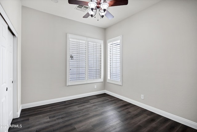 1612 E Zion Way, Chandler, AZ 85249 - unfurnished bedroom featuring ceiling fan, dark wood-type flooring, and a closet