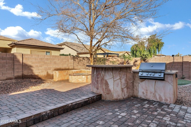 1612 E Zion Way, Chandler, AZ 85249 - view of patio featuring area for grilling, grilling area, and a fire pit