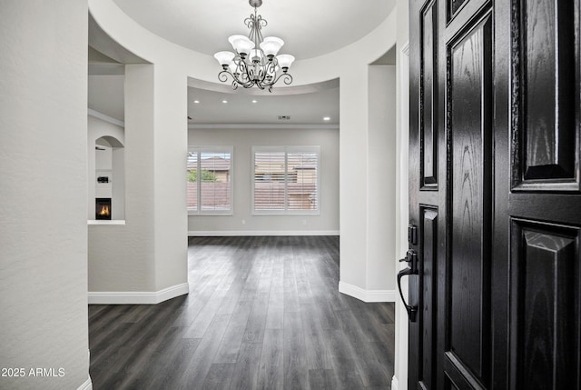 1612 E Zion Way, Chandler, AZ 85249 - entrance foyer featuring ornamental molding, dark wood-type flooring, and a chandelier