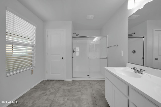 bathroom featuring vanity and walk in shower