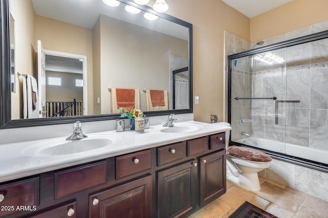 965 E Virgo Pl, Chandler, AZ 85249 - bathroom featuring combined bath / shower with glass door, double vanity, and toilet