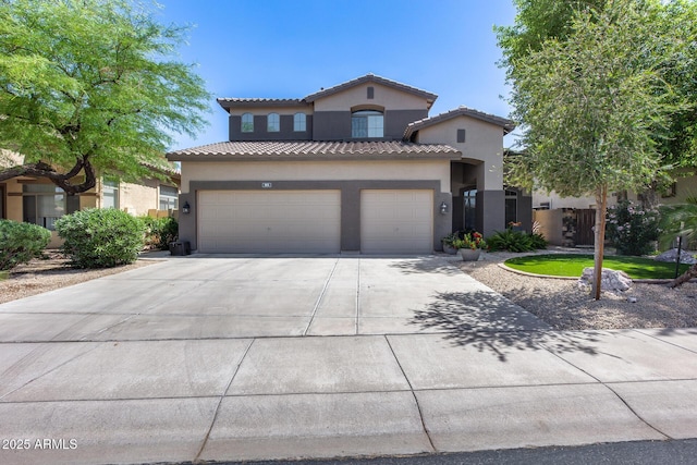 965 E Virgo Pl, Chandler, AZ 85249 - mediterranean / spanish-style home featuring concrete driveway, stucco siding, a tile roof, and a garage