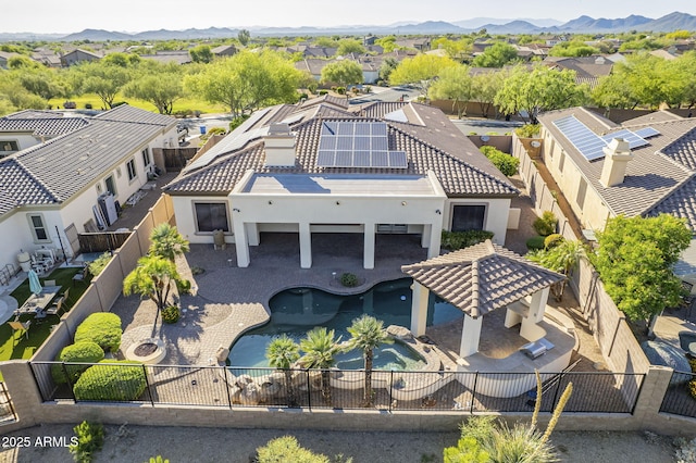 5243 E Windstone Trl, Cave Creek, AZ 85331 - aerial perspective of suburban area with a pool area and a mountain backdrop