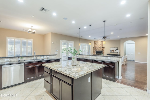 5243 E Windstone Trl, Cave Creek, AZ 85331 - kitchen with dishwasher, a large island, ceiling fan, open floor plan, and recessed lighting