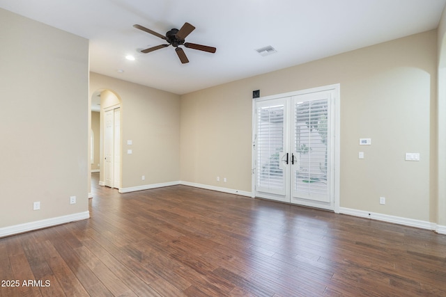 5243 E Windstone Trl, Cave Creek, AZ 85331 - empty room with arched walkways, ceiling fan, hardwood / wood-style floors, french doors, and recessed lighting
