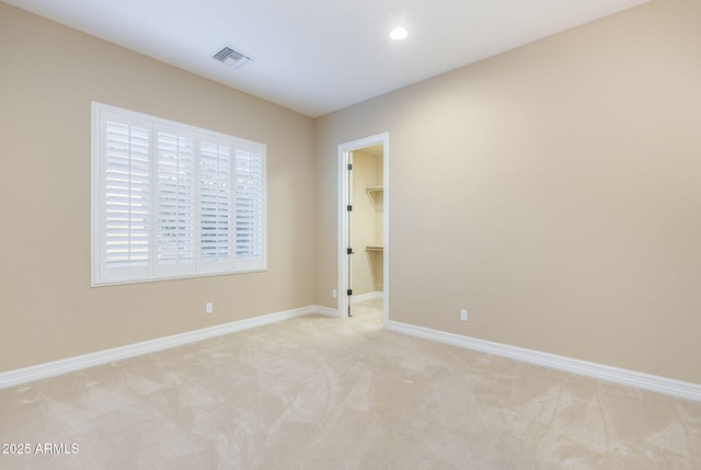 5243 E Windstone Trl, Cave Creek, AZ 85331 - spare room featuring light colored carpet and recessed lighting