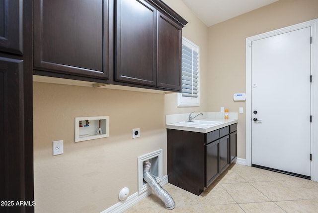 5243 E Windstone Trl, Cave Creek, AZ 85331 - laundry room with electric dryer hookup, cabinet space, light tile patterned floors, washer hookup, and hookup for a gas dryer