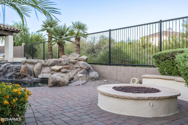 5243 E Windstone Trl, Cave Creek, AZ 85331 - view of patio / terrace featuring a fire pit