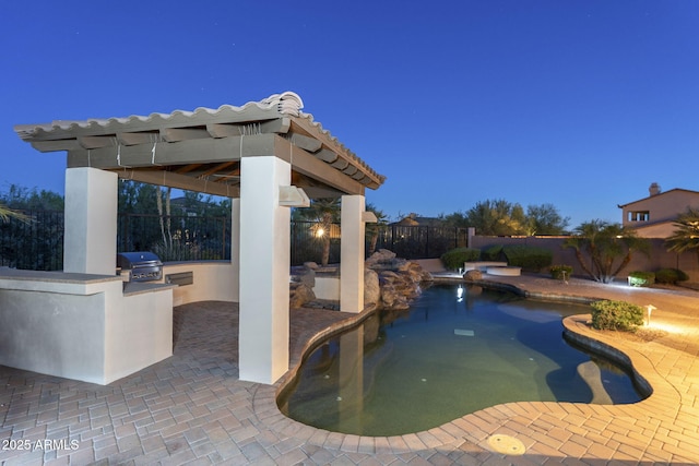 5243 E Windstone Trl, Cave Creek, AZ 85331 - view of pool featuring an outdoor kitchen, a fenced backyard, a patio, and a gazebo