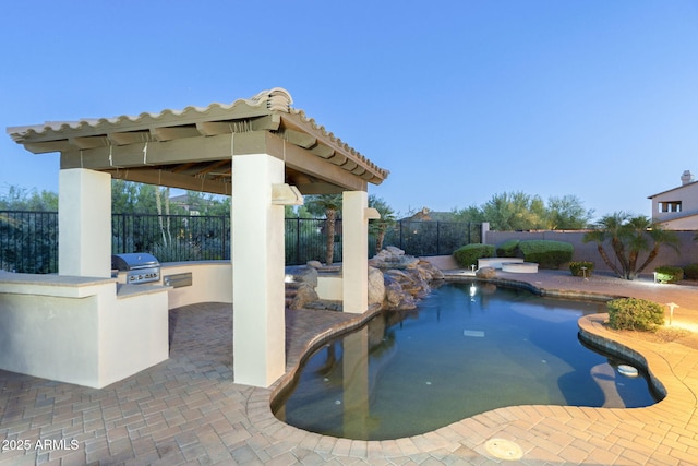 5243 E Windstone Trl, Cave Creek, AZ 85331 - view of pool with an outdoor kitchen, a gazebo, a fenced backyard, and a pool with connected hot tub