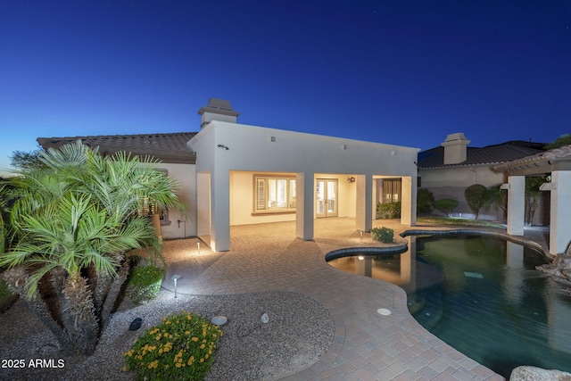 5243 E Windstone Trl, Cave Creek, AZ 85331 - pool at twilight with a patio area and an outdoor pool
