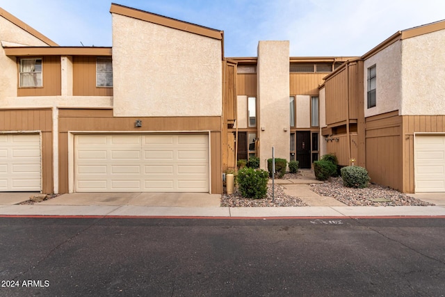 view of property with a garage