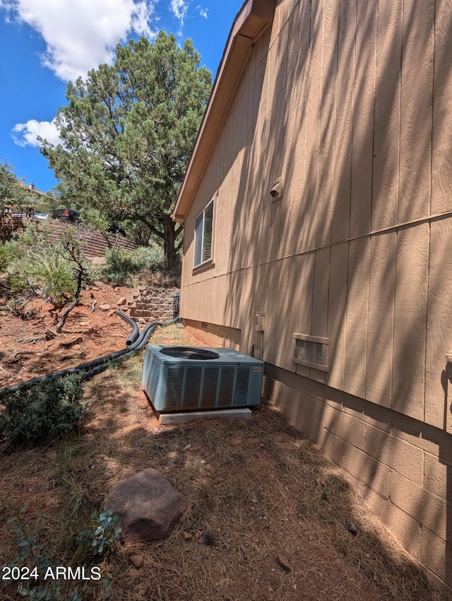 view of yard featuring central AC