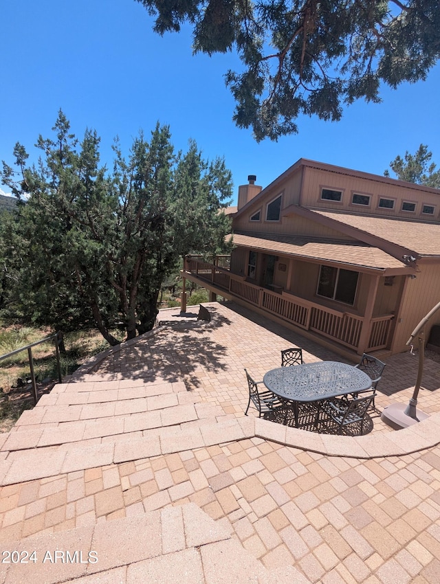 view of patio with a wooden deck